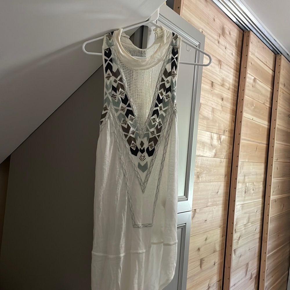 Ivory free people tunic, size small. Beading and mesh detail